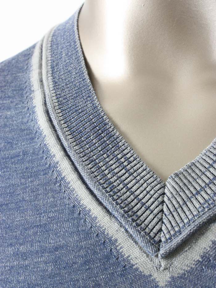 This Stoll sample shows a pullover with French shoulder in plated jersey with inverse plated edges and V-neck and seams with on the rear knitted curled edges.